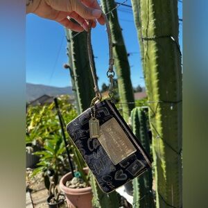 Coach vintage gold/black wristlet